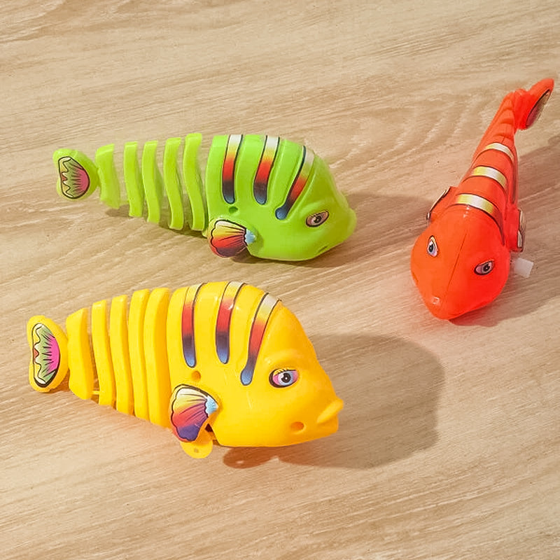 Clockwork svängande tecknad fisk leksaker