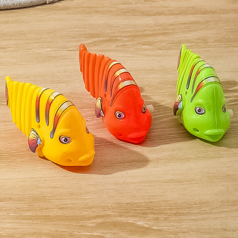 Clockwork svängande tecknad fisk leksaker