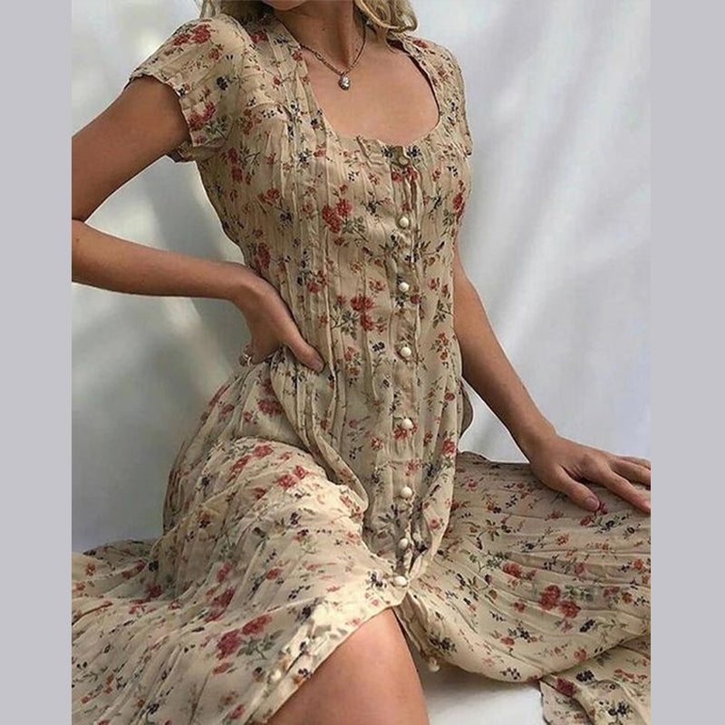 Enkelknäppt blommig kortärmad klänning